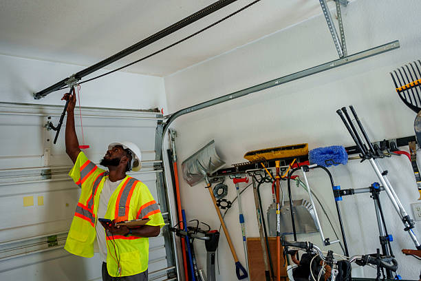 Professional Garage Door Panel Replacement technician working in Summerfield, MD